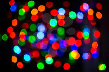 Holidays lights background. Bokeh background. Lightbulb background