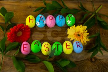 Easter eggs on a dark wooden background. Easter background. Easter eggs. Easter. Easter symbol.  Easter card. Easter greetings. Happy Easter