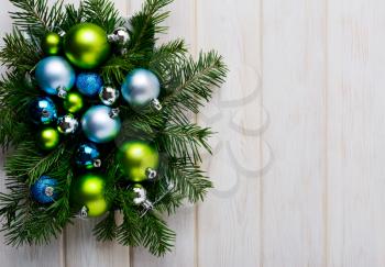 Christmas background with green, blue and silver ornaments. Christmas party decoration. Christmas greeting background. Copy space.