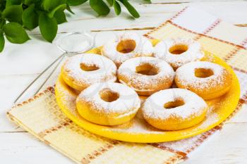 Homemade Hanukkah donuts with caster sugar. Hanukkah sweet donuts. Sweet dessert pastry doughnuts.  