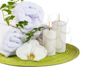 Spa concept with white orchid isolated on white.  Spa treatment concept. Wellness still life.