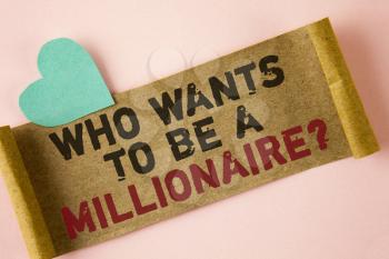 Word writing text who Wants To Be A Millionaire Question. Business concept for Earn more money applying knowledge written Folded Cardboard paper piece plain background Heart next to it.