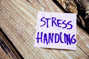 Positive handwritten message on the white paper about stress handling. Positive and motivational handwritten messages. Stress handling motivational messages.