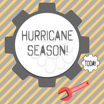 Writing note showing Hurricane Season. Business concept for time when most tropical cyclones are expected to develop Wheel Gear and Wrench Mechanical Tool for SEO and Web Icon