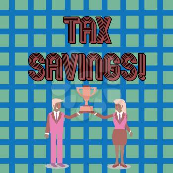 Text sign showing Tax Savings. Business photo text means that you pay reduced amount of taxes than normal Man and Woman in Business Suit Holding Together the Championship Trophy Cup