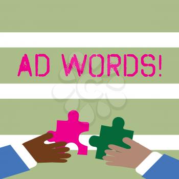 Word writing text Ad Words. Business photo showcasing Advertising a business over first of internet search results Two Hands Holding Colorful Jigsaw Puzzle Pieces about to Interlock the Tiles