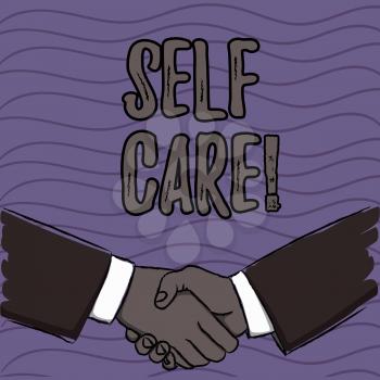 Word writing text Self Care. Business photo showcasing practice of taking action preserve or improve ones own health Businessmen Shaking Hands Firmly as Gesture Form of Greeting and Agreement