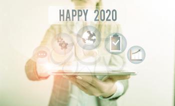 Conceptual hand writing showing Happy 2020. Concept meaning time or day at which a new calendar year begin from now Female human wear formal work suit presenting smart device