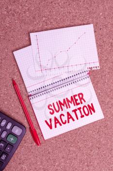 Writing note showing Summer Vacation. Business concept for the time when children do not go to school in the summer Desk notebook paper office paperboard study supplies chart