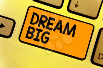 Word writing text Dream Big. Business concept for To think of something high value that you want to achieve Keyboard yellow key Intention create computer computing reflection document