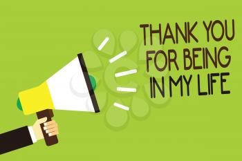 Conceptual hand writing showing Thank You For Being In My Life. Business photo showcasing loving someone for being by your side Man holding megaphone green background message speaking loud