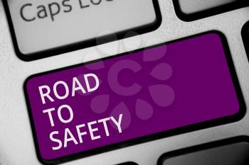 Word writing text Road To Safety. Business concept for Secure travel protect yourself and others Warning Caution Keyboard purple key Intention create computer computing reflection document