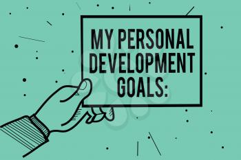 Text sign showing My Personal Development Goals. Conceptual photo Desires Wishes Career Business planning Man hand holding paper communicating information dots turquoise background