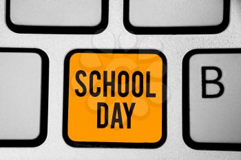 Text sign showing School Day. Conceptual photo starts from seven or eight am to three pm get taught there Keyboard orange key Intention create computer computing reflection document