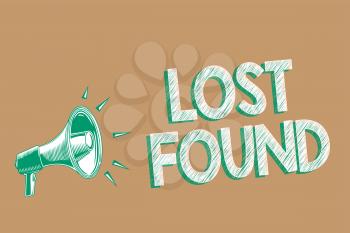Conceptual hand writing showing Lost Found. Business photo showcasing Things that are left behind and may retrieve to the owner Megaphone brown background important message speaking loud
