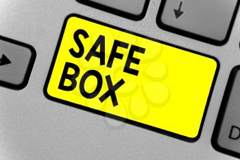 Writing note showing Safe Box. Business photo showcasing A small structure where you can keep important or valuable things Keyboard yellow key Intention computer computing reflection document