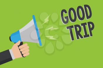 Writing note showing Good Trip. Business photo showcasing A journey or voyage,run by boat,train,bus,or any kind of vehicle Man holding megaphone loudspeaker green background message speaking