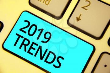 Text sign showing 2019 Trends. Conceptual photo things that is famous for short period of time in current year Keyboard blue key Intention create computer computing reflection document