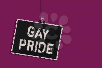 Word writing text Gay Pride. Business concept for Dignity of an idividual that belongs to either a man or woman Hanging blackboard message communication information sign purple background