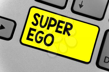 Writing note showing Super Ego. Business photo showcasing The I or self of any person that is empowering his whole soul Keyboard yellow key Intention computer computing reflection document