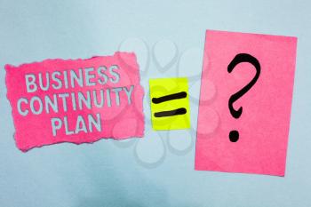 Conceptual hand writing showing Business Continuity Plan. Business photo showcasing creating systems prevention deal potential threats Pink paper equal sign question mark asking important answer