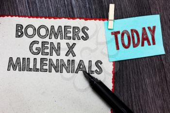 Writing note showing Boomers Gen X Millennials. Business photo showcasing generally considered to be about thirty years White page red borders marker clothespin reminder wooden background