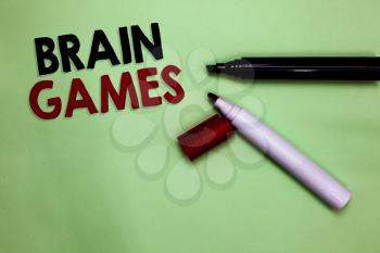 Text sign showing Brain Games. Conceptual photo psychological tactic to manipulate or intimidate with opponent Open markers Inspiration communicating ideas messages green background