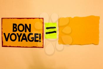 Writing note showing Bon Voyage. Business photo showcasing used express good wishes to someone about set off on journey Orange paper notes reminders equal sign important messages to remember