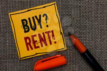 Conceptual hand writing showing Buy question Rent. Business photo showcasing Group that gives information about renting houses Orange paper Marker Communicate ideas Jute background