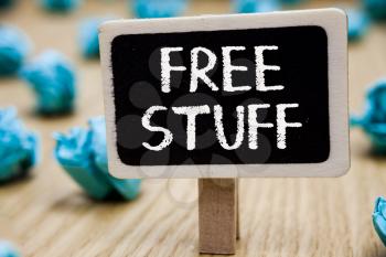 Text sign showing Free Stuff. Conceptual photo Any thing that you can have in a store that is not being paid Blackboard crumpled papers several tries mistake not satisfied wooden floor