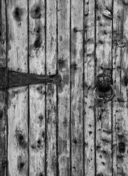 Old wooden doors with ring knocker