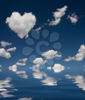 Heart cloud and reflections in water