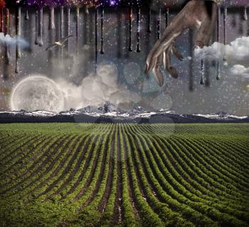 Surrealism. Field with green rows. Giant moon rises over the mountains. Another dimension flows down. Hand of God.