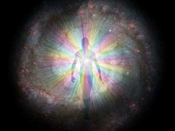Man figure in rainbow light and stars. Soul or aura