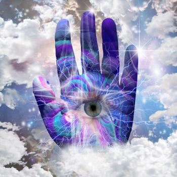 The Hand of Alien Creator. Eye on a human palm