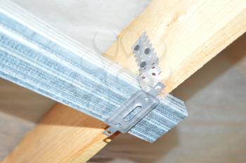 Mounting units for the metal profile for drywall