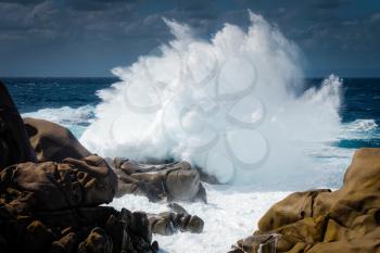 Waves Pounding the Coastline at Capo Testa