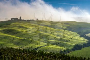 PIENZA, TUSCANY/ITALY - MAY 22 : Mist rolling through Val d'Orcia in Tuscany on May 22, 2013