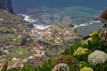 PORTO DA CRUZ, MADEIRA/PORTUGAL - APRIL 12 : View of Porto da Cruz Madeira from a ridge near Portella in Madeira on April 12, 2008