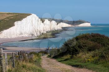 Seven Sisters and Three People at the South Coast of England