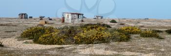Old shacks and boats on Dungeness beach