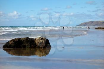 BUDE, CORNWALL/UK - AUGUST 12 : People on the beach at Bude on August 12, 2013. Unidentified people.