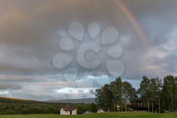 Sunset and rainbow over Spey Valley Golf and Country Club