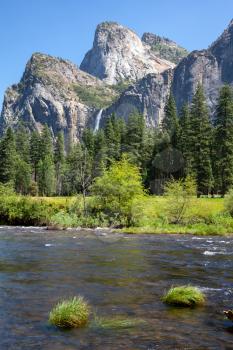 View across the Merced River to the mountains in Yosemite National Park