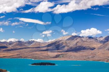Scenic view of Motuariki Island in the colourful Lake Tekapo