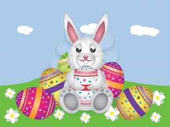 Cute small white lovely bunny with colorful Easter eggs.