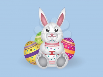 Cute small white lovely bunny with colorful Easter eggs.
