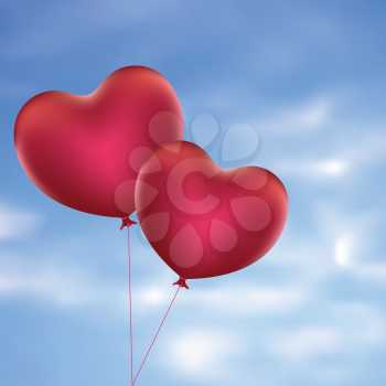 Romantic red balloons in a shape of a heart.