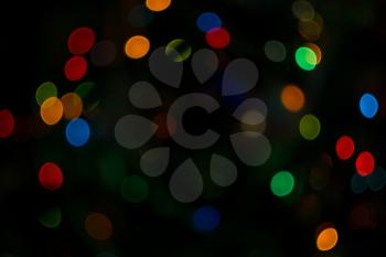 Abstract circular bokeh blurred color light texture as background.