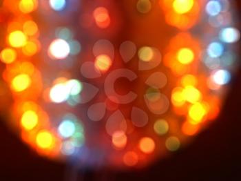 Abstract shiny background with colorful bokeh lights.